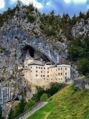 Predjama, castle at the cave mouth in Postojna, Slovenia in springtime photo
