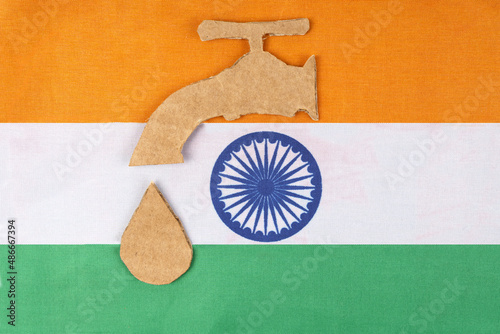 On the flag of India, the figure of a crane with a drop of water photo