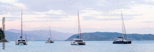 Fototapete Mediterranean bay with sailing boats catamarans panoramic banner