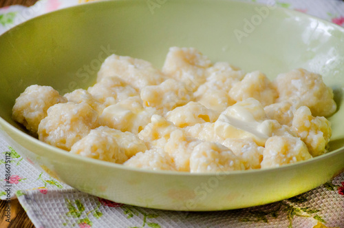 Lazy dumplings with cottage cheese and sour cream.