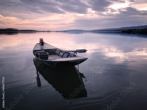 boat on the river © sreten80