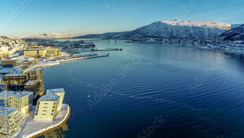 NORWAY, TROMSO - JANUARY 25, 2022 - Aerial photo over Tromso during winte with snow