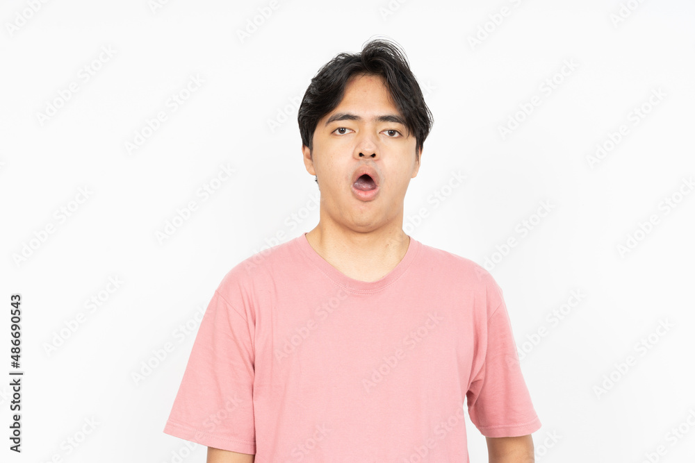 Shocked face of Asian man in shirt on white background. Shocked face of Asian man in shirt on white background.
