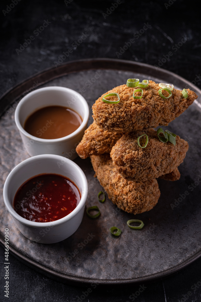 Asian fusion vegan meatfree jackfruit drumsticks with sweet hot sesame