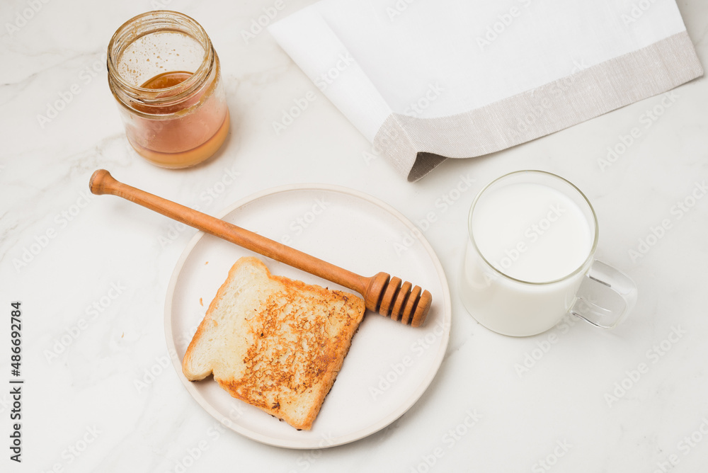 Croutons for breakfast with honey and milk. Croutons for breakfast with honey and milk.