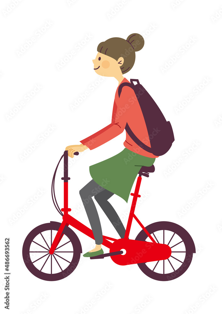 Fototapeta premium 自転車に乗る若い女性