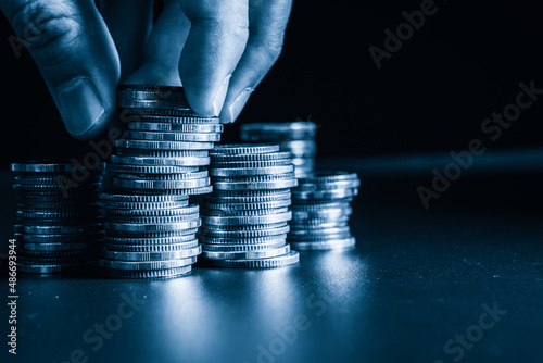 Fotografiet Pile of gold coins money stack in finance treasury deposit bank account saving