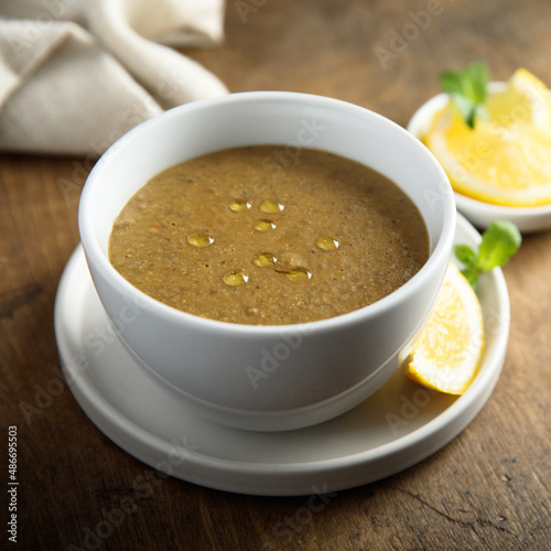 Traditional homemade lentil soup with lemon