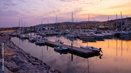 Colorful sea sunrise in calm summer day, Tuscany
