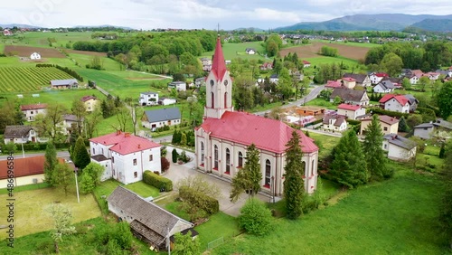 Drone video of Evangelical-Augsburg Church in Miedzyrzecze Gorne village, Silesia region of Poland photo