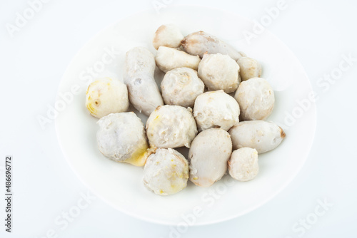 A dish of peeled cooked taro