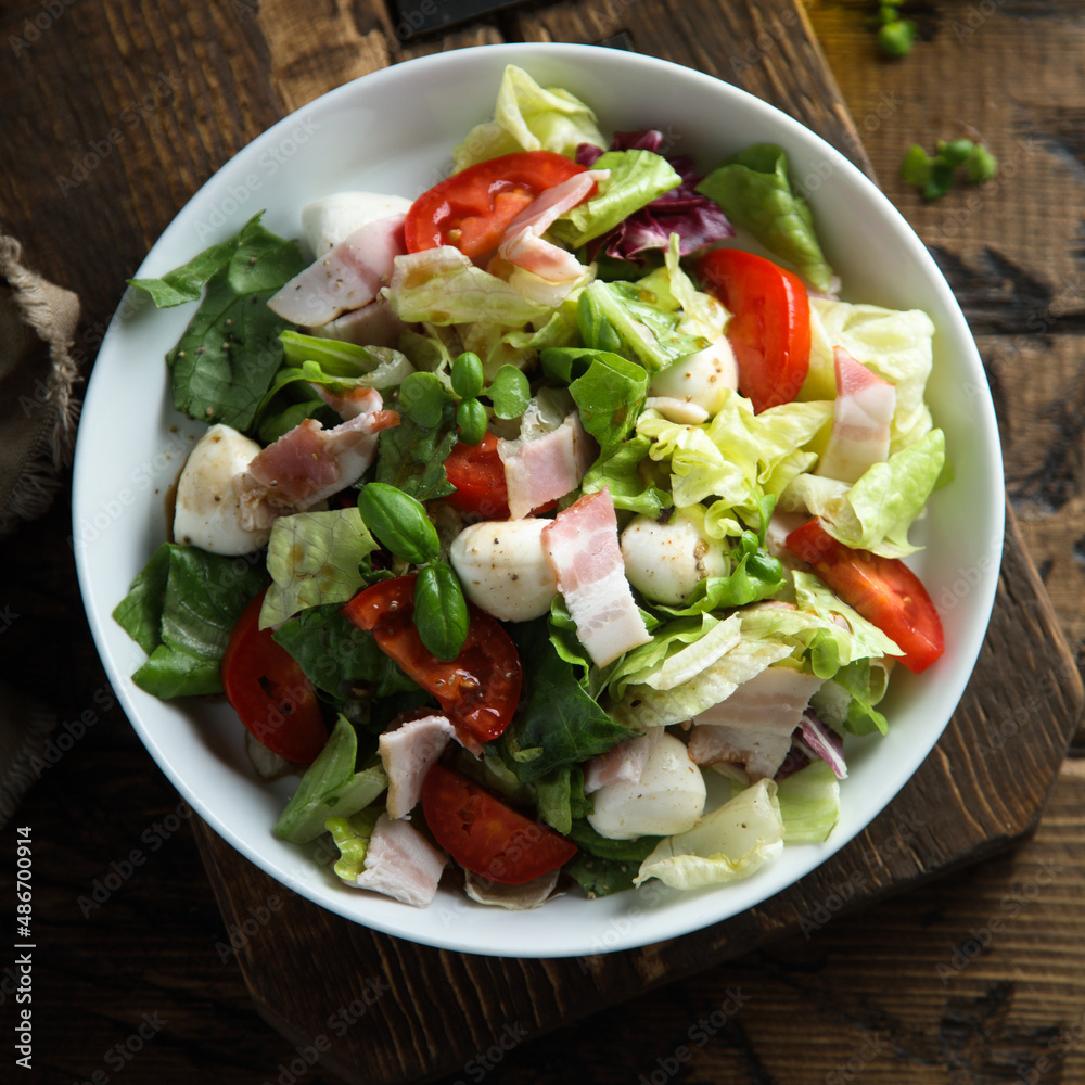 Vegetable salad with bacon and mozzarella Vegetable salad with bacon and mozzarella