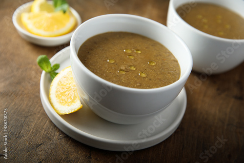 Traditional homemade lentil soup with lemon