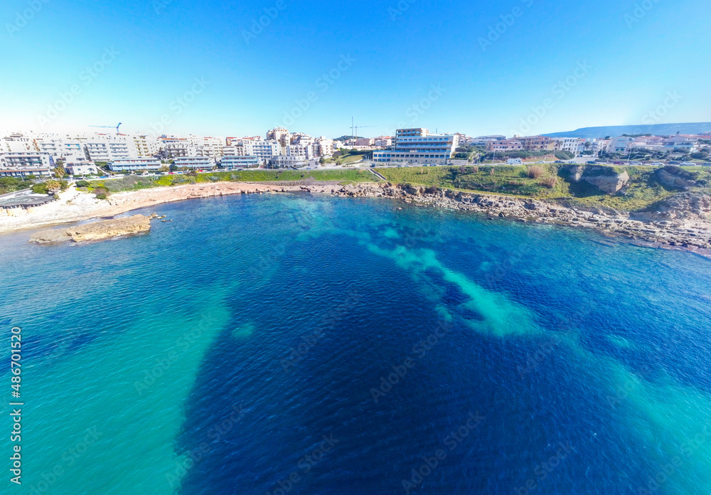 Blue sea in Alghero coastline on a sunny day