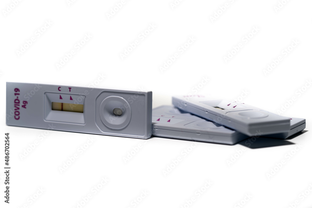 Obraz premium used antigen test kits. proper disposal of antigen covid test kits with positive result