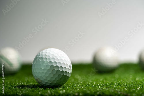 Golf ball on grass. golf sports concept