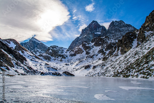 Il Monviso ed il lago Fiorenza coperto di ghiaccio photo