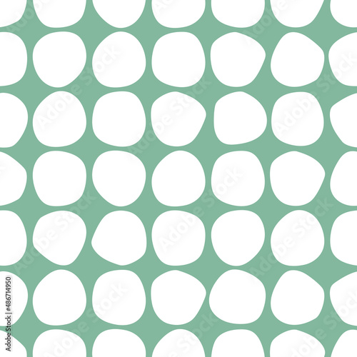 Seamless abstract pattern with white shabby spots on turquoise background.