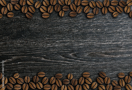 many roasted coffee beans ornament on a wooden background illustration