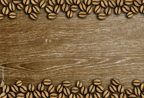many roasted coffee beans ornament on a wooden background illustration