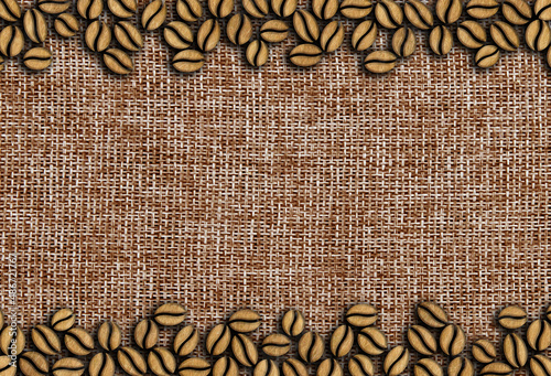 roasted coffee beans with wooden spoon on a wooden background top view
