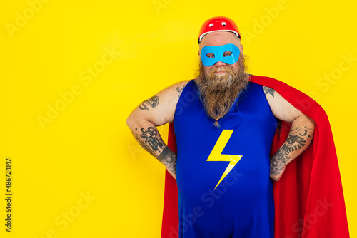 Funny man wearing a superhero costume