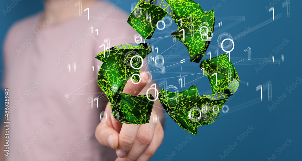 hand holding green recycle symbol hand holding green recycle symbol