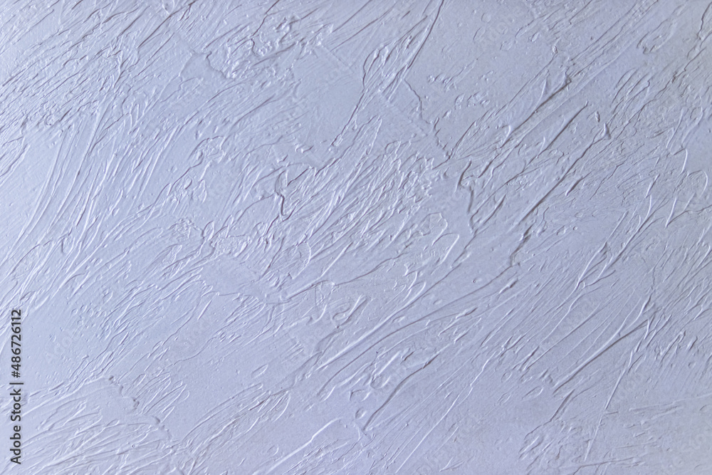 texture of decorative plaster of light.New gray plaster on the wall texture of decorative plaster of light.New gray plaster on the wall