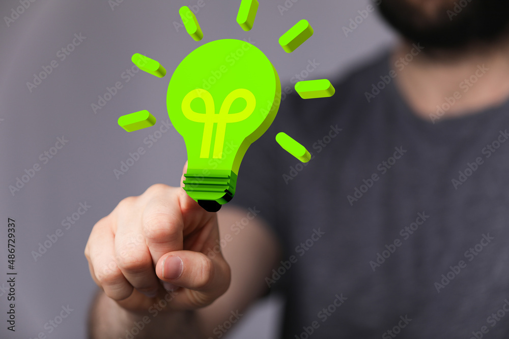 hand holding eco light bulb energy concept hand holding eco light bulb energy concept