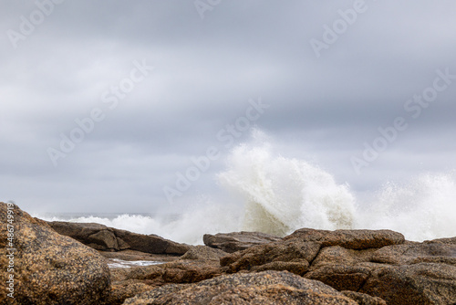 wave crashing over a rocks
