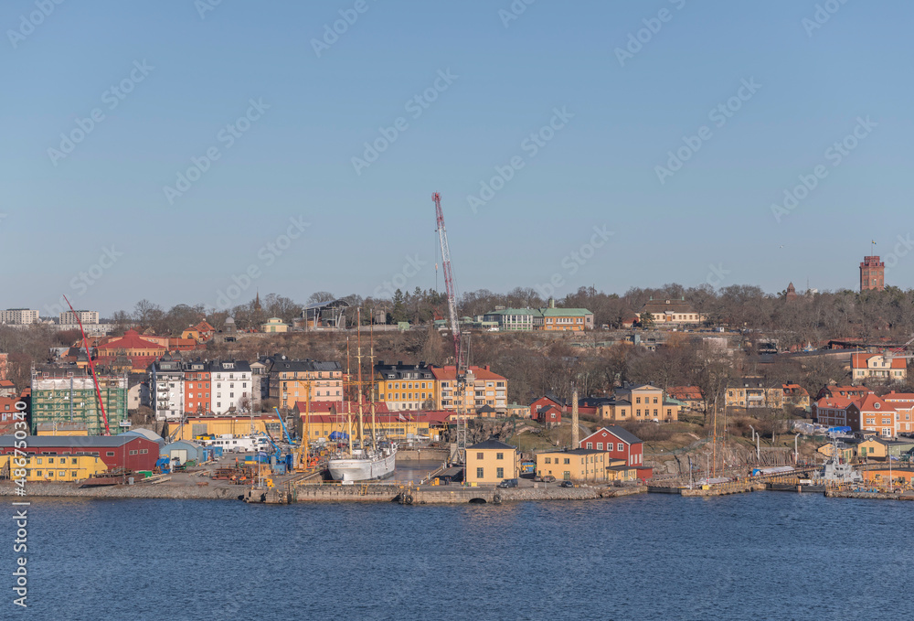 Panorama harbor view, amusements parks and museums around the Baltic side bays a sunny winter day in Stockholm