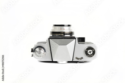 Very rare old 35 mm SLR film camera on white background.