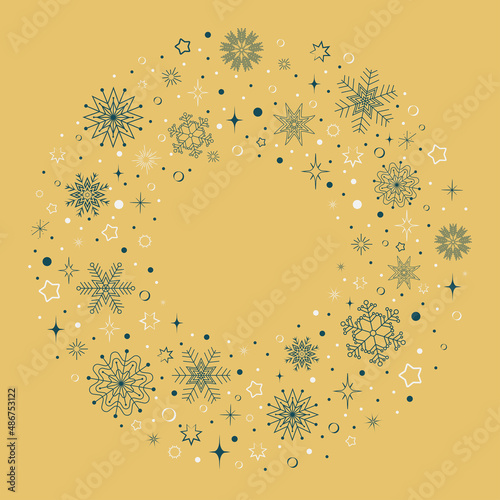 round frame with a pattern of blue and white snowflakes on a beige background