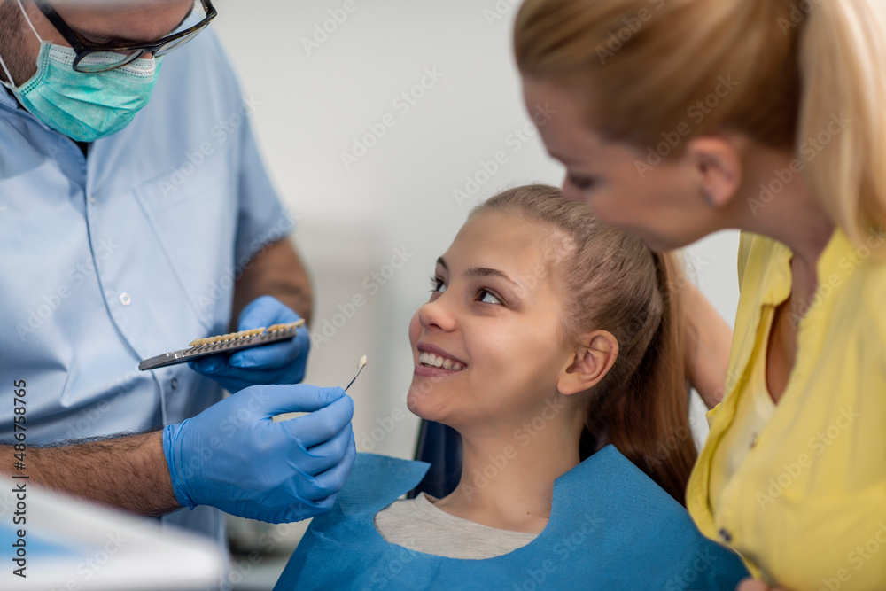 Girl sitting in the dentists office