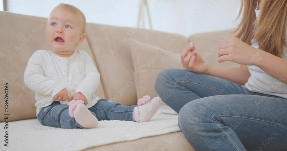 Adorable baby laughing at a wall Adorable baby laughing at a wall
