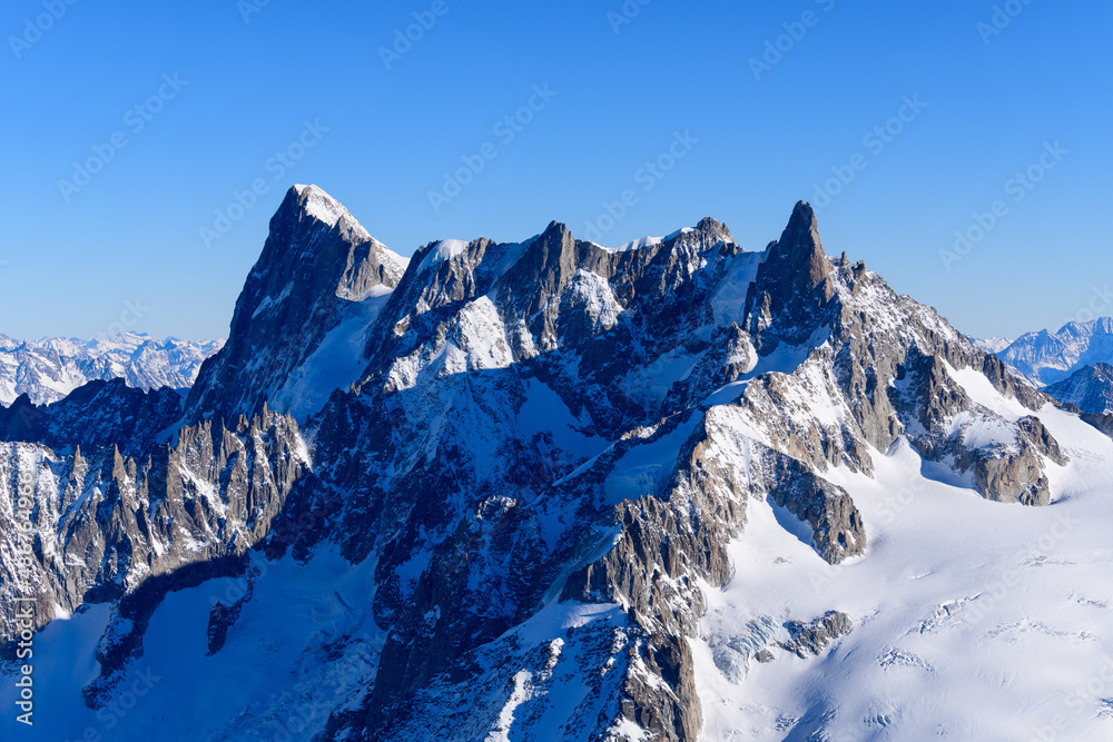 Grandes Jorasses, Dent and Glacier du Geant, Aiguilles Marbrees in Europe, France, Rhone Alpes, Savoie, Alps in winter on a sunny day.
