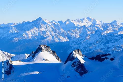 Snowcapped Mont Grivola and Gran Paradiso in Europe, France, Rhone Alpes, Savoie, Alps, in winter on a sunny day.