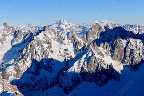 Le Grand Combin and Mont Cervin in Europe, France, Rhone Alpes, Savoie, Alps, in winter on a sunny day. © Florent