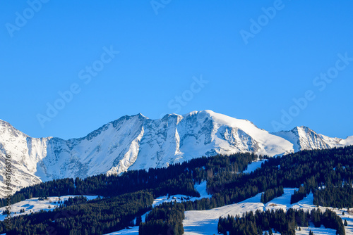 The Domes de Miage in the Mont Blanc massif in Europe, France, Rhone Alpes, Savoie, Alps, in winter on a sunny day.