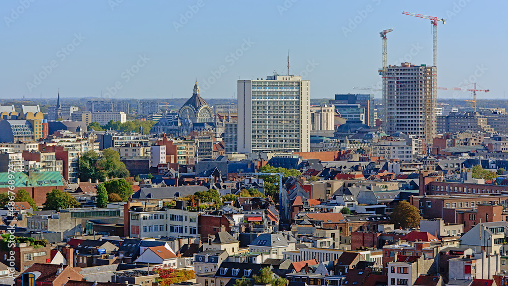 Aerial view on the rooftops, towers and train station of the city of Antwerp, Flanders, Belgium
