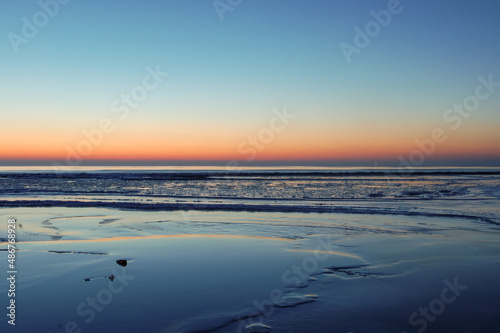 Frozen Baltic sea during a beautiful calm sunset in Liepaja  Latvia