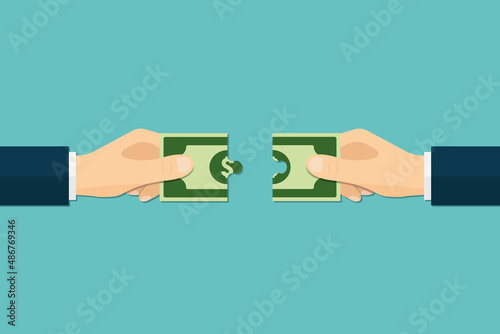 Jigsaw puzzle with banknote. hand holding banknote.