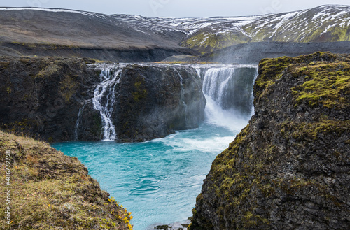 Picturesque waterfall Sigoldufoss autumn view. Season changing in southern Highlands of Iceland.