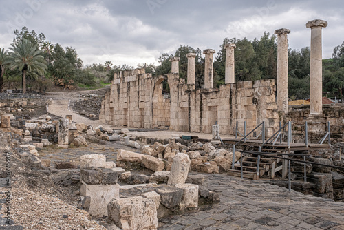View of the Decumanus, east-west oriented street, perpendicular to the Cardo, with a row of columns in the Ancient Roman city in Beit Shean Nationl Park, Jordan Valey, Northern Israel, Israel