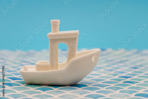 toy boat on blue background