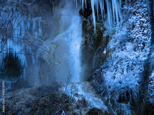 Frozen waterfall, Thermal waterfall Geoagiu Bai , Romania photo