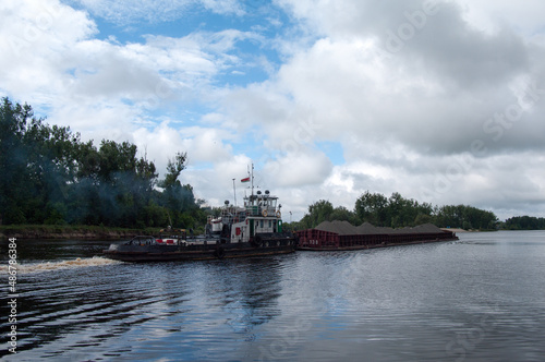 Pusher tug "BT-0702" with barge "R-0538" at the confluence of the Pripyat and Pina rivers, Pinsk, Brest region, Belarus, June 15, 2014