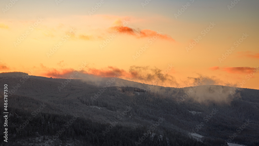 Picturesque winter sunrise from Krzyżna Mountain in the Sokole Mountains
