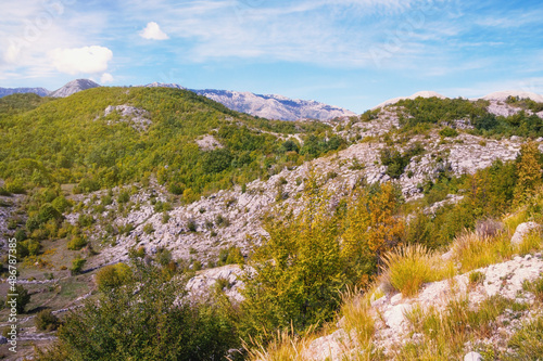 Sunny autumn day in mountains, karst mountain landscape. Dinaric Alps, Montenegro, Sitnica region photo