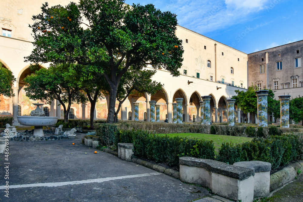 The inner courtyard of the monastery of Santa Chiara, decorated with 17th century painted majolica in Naples, Italy.